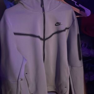 mica green/black nike tech jacket